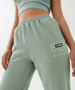 P.E NATION WOMEN GRAND STAND TRACK PANT IN ICEBERG GREEN