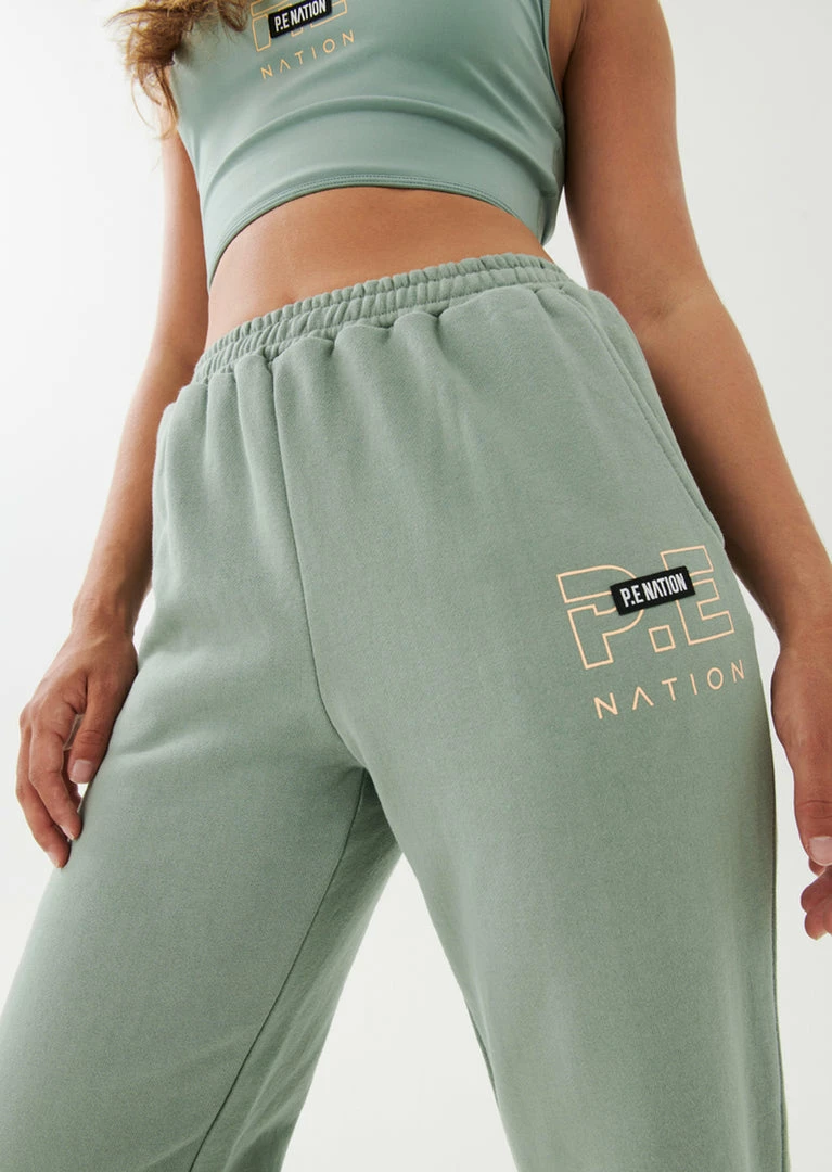 P.E NATION WOMEN GRAND STAND TRACK PANT IN ICEBERG GREEN