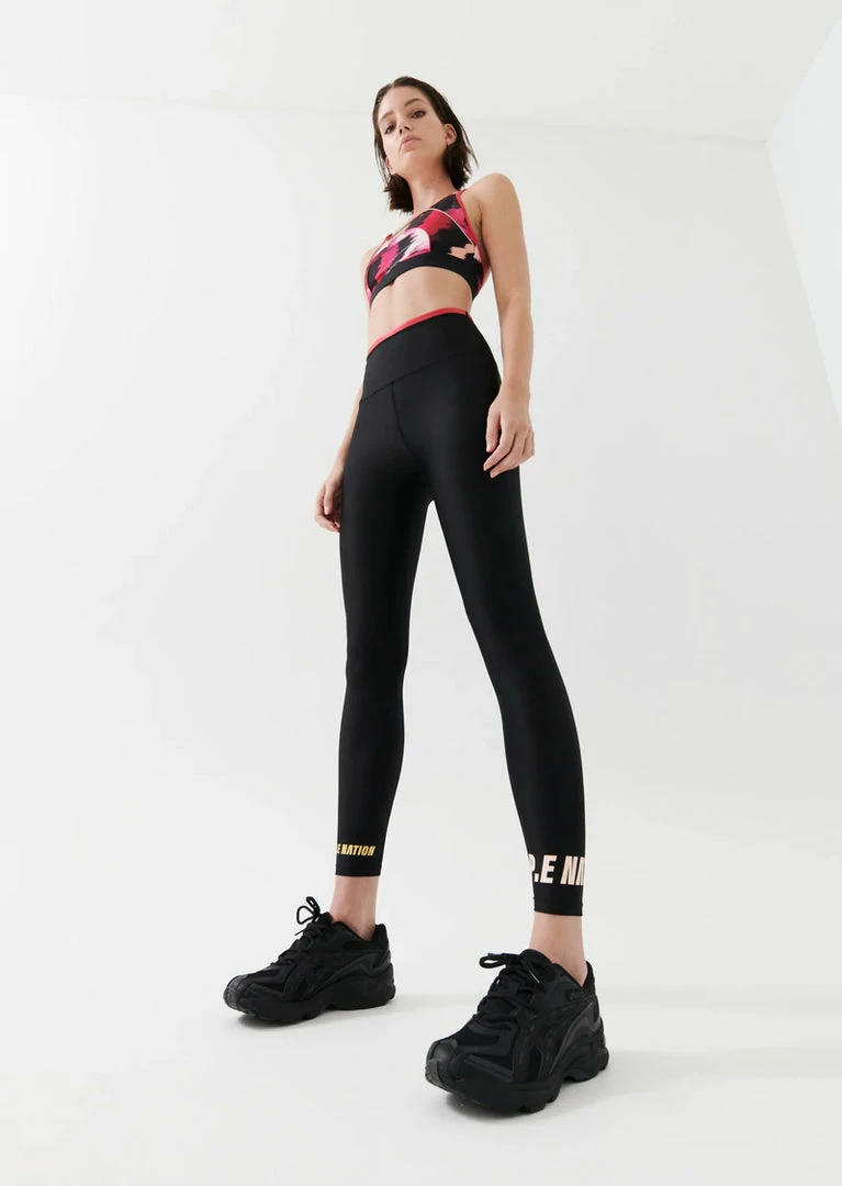 P.E NATION WOMEN DOUBLE UNDER LEGGING IN BLACK