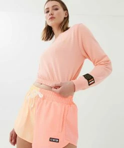 P.E NATION WOMEN CLUBHOUSE SWEATER IN SOFT CORAL