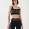 P.E NATION BLAST SPORTS BRA IN DARK GREY WOMEN