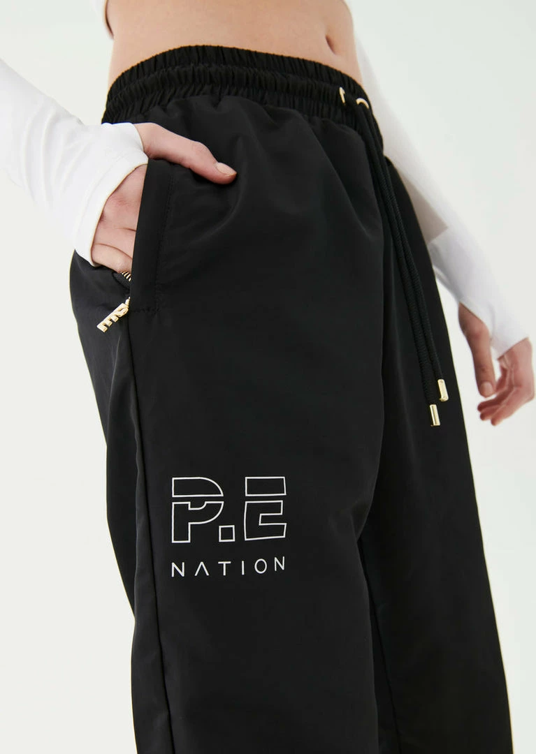 P.E NATION HALF VOLLEY TRACKPANT IN BLACK