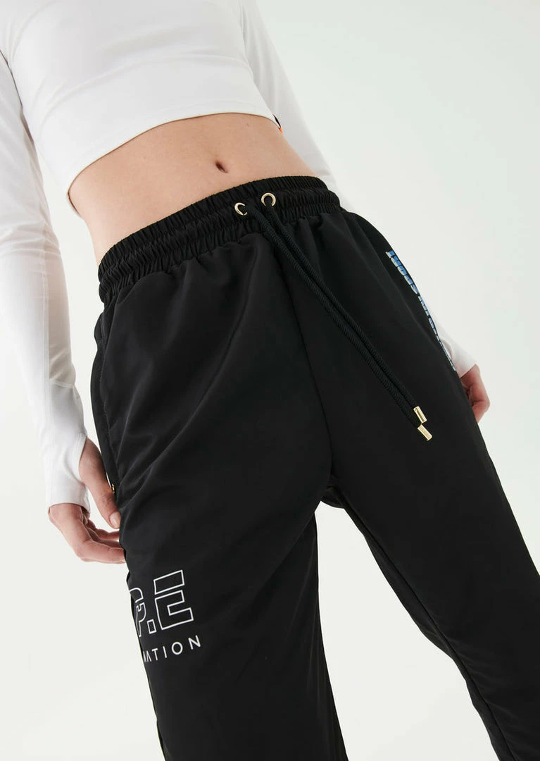 P.E NATION HALF VOLLEY TRACKPANT IN BLACK