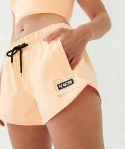 P.E NATION RAMP RUN SHORT IN PASTEL PEACH WOMEN