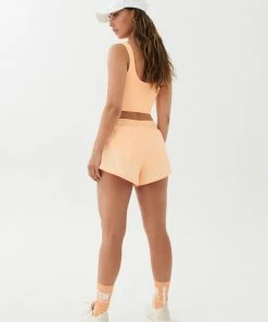 P.E NATION RAMP RUN SHORT IN PASTEL PEACH WOMEN